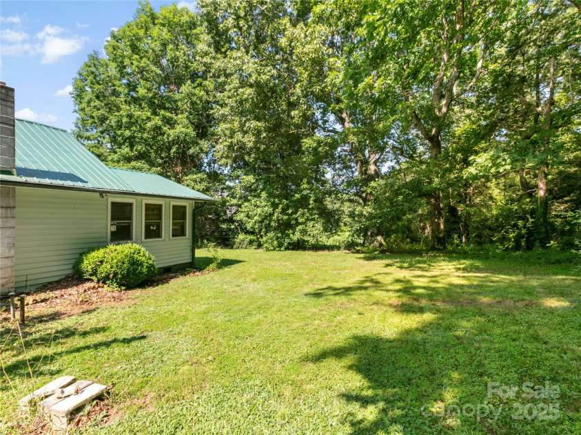 119 John Lee Montgomery Drive, Hendersonville, NC 28792.  MLS# CAR4277677, YatesRealty ID 24744. 