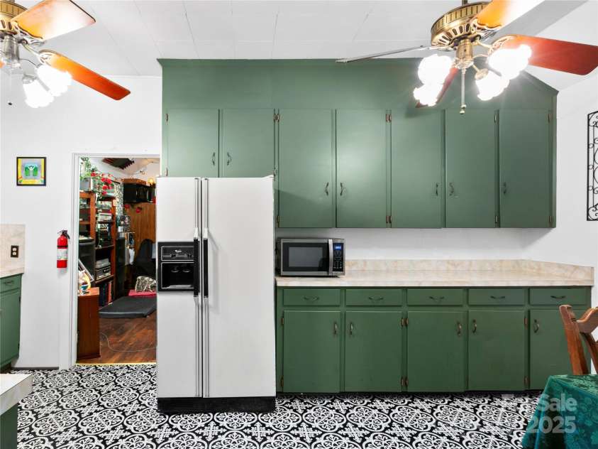 119 John Lee Montgomery Drive, Hendersonville, NC 28792.  MLS# CAR4277677, YatesRealty ID 24744. Additional countertop space and kitchen storage