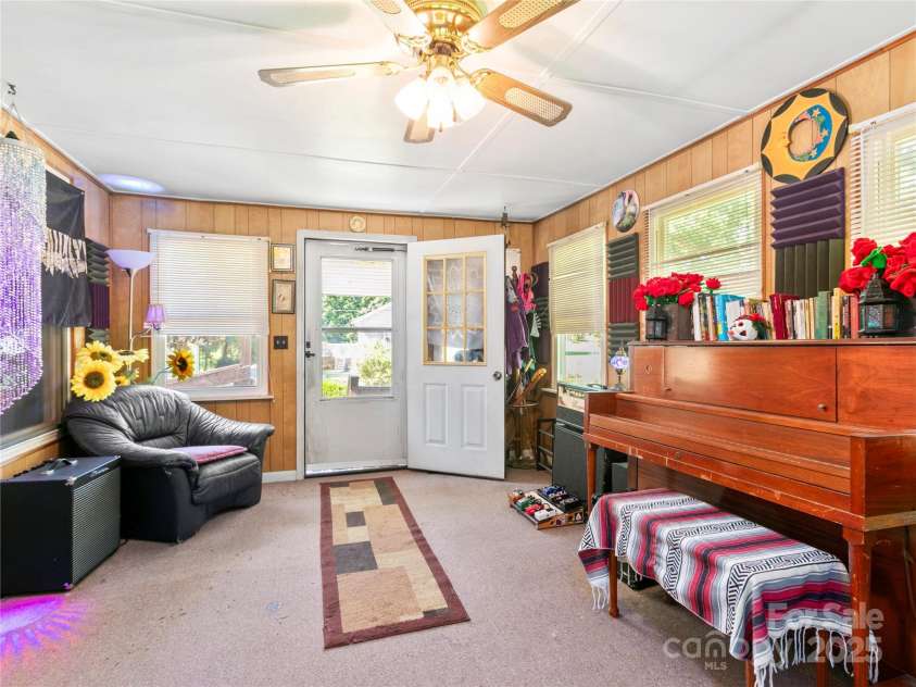 119 John Lee Montgomery Drive, Hendersonville, NC 28792.  MLS# CAR4277677, YatesRealty ID 24744. Entrance through the front sunroom