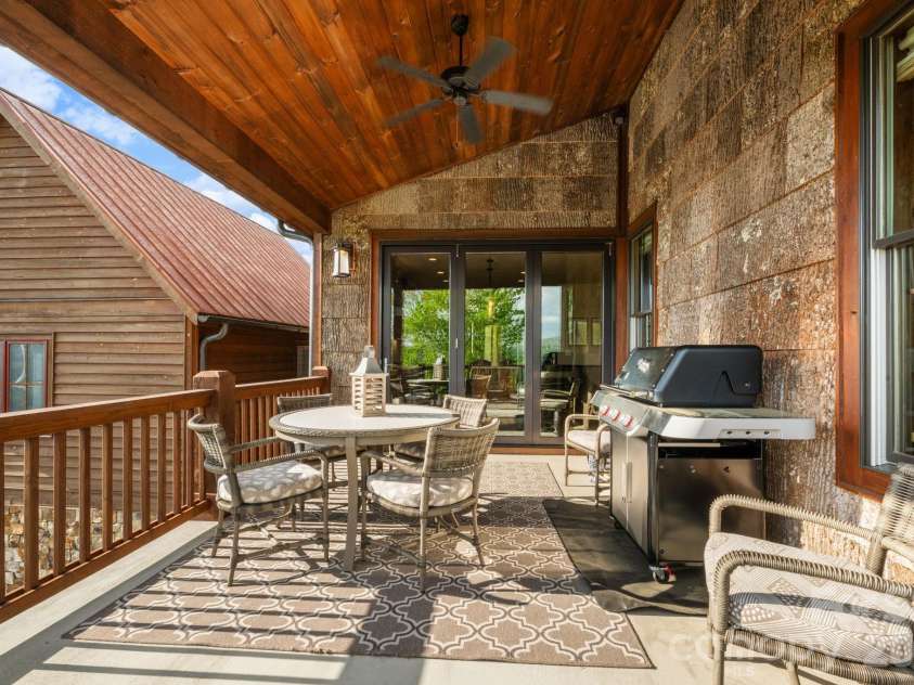 92 White Eagle Trail, Banner Elk, NC 28604.  MLS# CAR4381259, YatesRealty ID 24744. Covered deck off kitchen