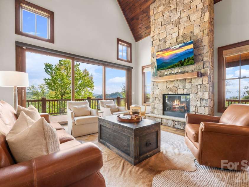 92 White Eagle Trail, Banner Elk, NC 28604.  MLS# CAR4381259, YatesRealty ID 24744. Stone fireplace