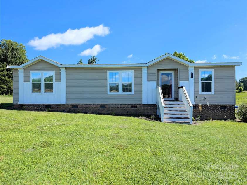 4713 White Store Road, Wingate, NC 28174.  MLS# CAR4270892, YatesRealty ID 24745. 