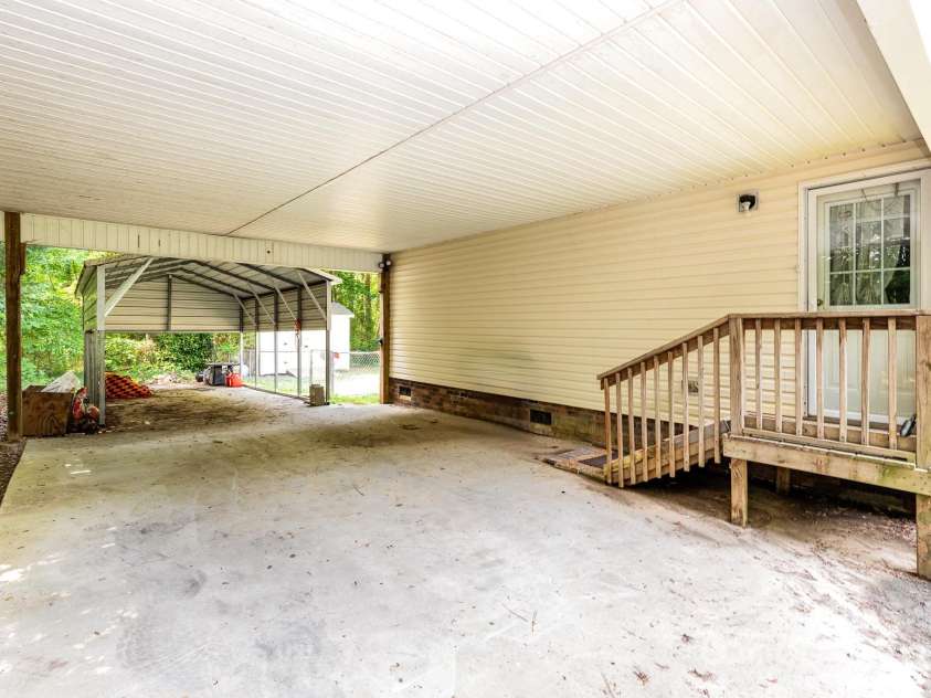 611 Robinson Street, Dallas, NC 28034.  MLS# CAR4261429, YatesRealty ID 24747. Attached covered parking and carport - plenty of parking!