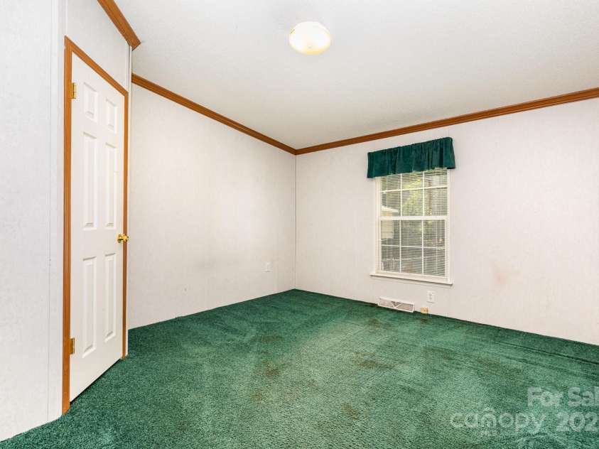 611 Robinson Street, Dallas, NC 28034.  MLS# CAR4261429, YatesRealty ID 24747. Bedroom 2 - Secondary bedrooms have large closets!