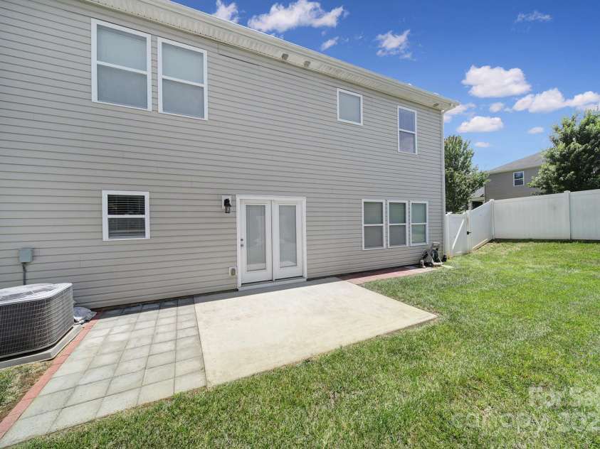 1051 Albany Park Drive, Fort Mill, SC 29715.  MLS# CAR4273686, YatesRealty ID 24748. Back Patio & Fenced Yard