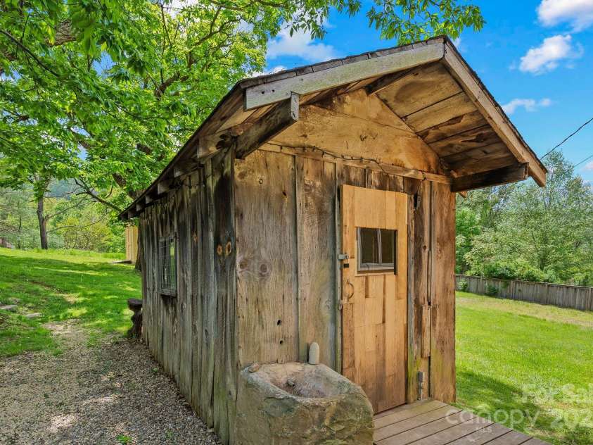 443 OX CREEK Road, Weaverville, NC 28787.  MLS# CAR4251407, YatesRealty ID 24753. Original Spring House still stands