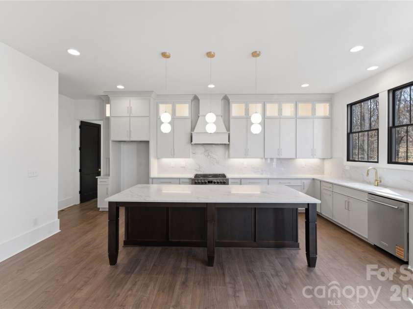 9408 Greyson Ridge Drive, Charlotte, NC 28277.  MLS# CAR4354369, YatesRealty ID 24754. View family room to Kitchen