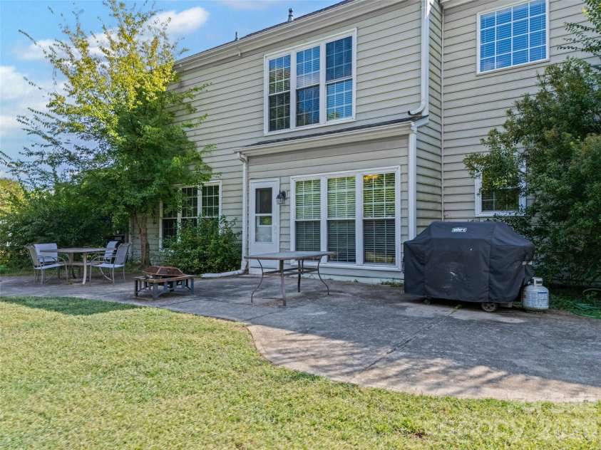 5899 Crimson Oak Court, Harrisburg, NC 28075.  MLS# CAR4302155, YatesRealty ID 2476. Back Pation