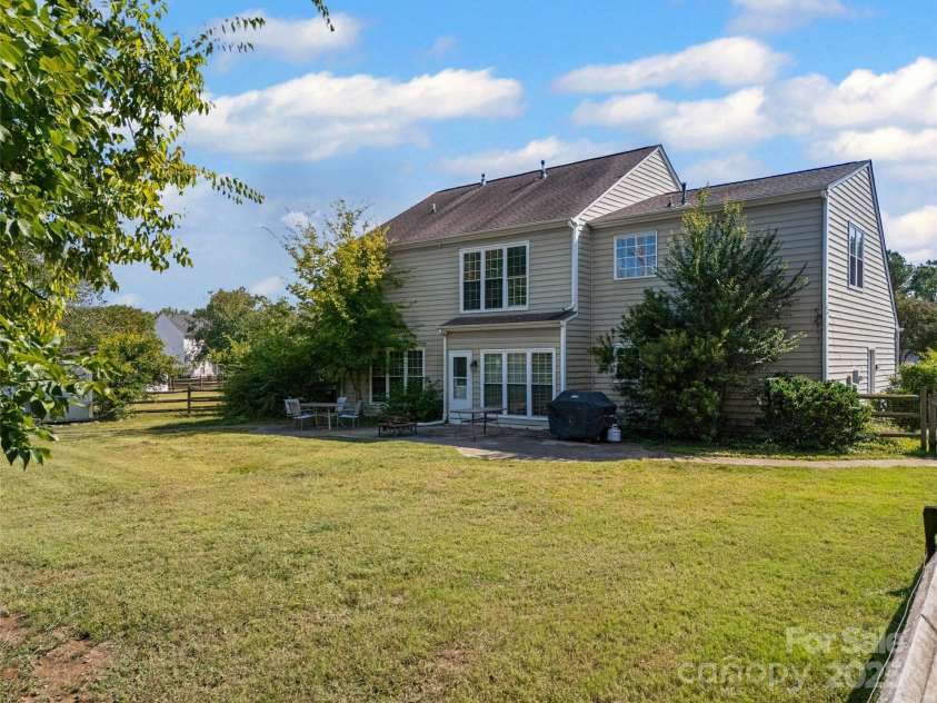 5899 Crimson Oak Court, Harrisburg, NC 28075.  MLS# CAR4302155, YatesRealty ID 2476. Backyard