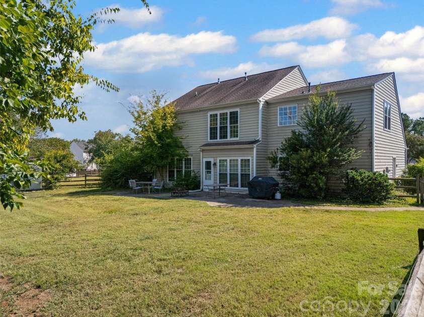 5899 Crimson Oak Court, Harrisburg, NC 28075.  MLS# CAR4302155, YatesRealty ID 2476. Backyard