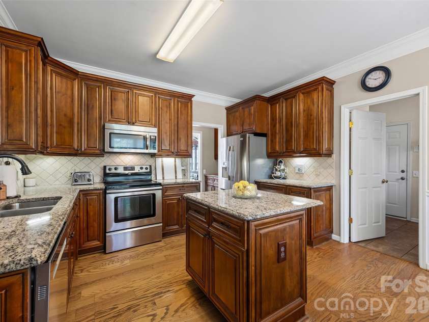 5899 Crimson Oak Court, Harrisburg, NC 28075.  MLS# CAR4302155, YatesRealty ID 2476. Kitchen