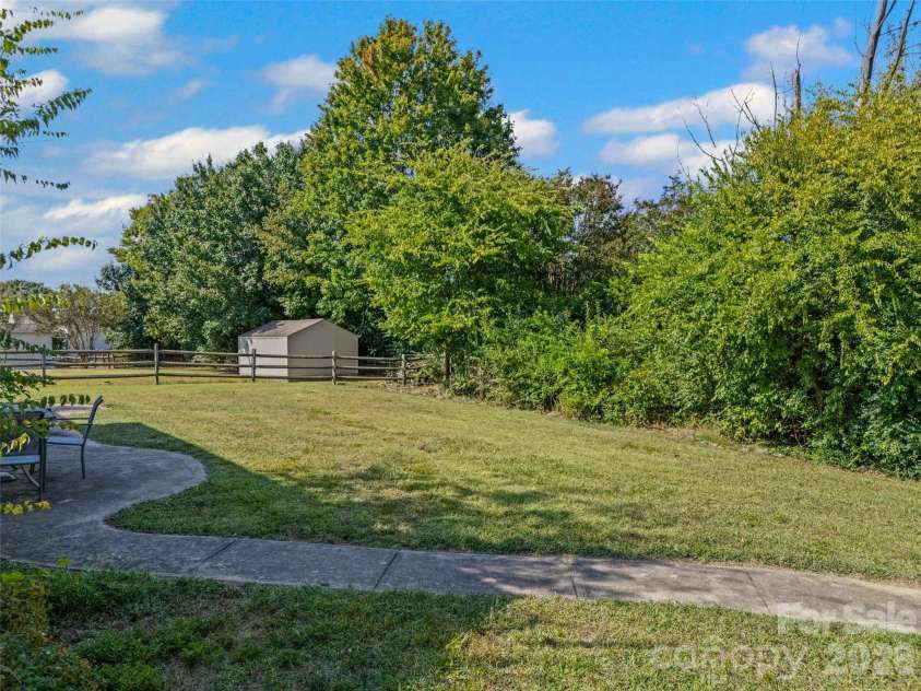 5899 Crimson Oak Court, Harrisburg, NC 28075.  MLS# CAR4302155, YatesRealty ID 2476. Privacy in Backyard