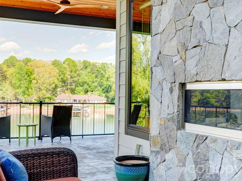 644 Normandy Road, Mooresville, NC 28117.  MLS# CAR4363129, YatesRealty ID 24760. Private Covered Patio Adjoining Primary Suites