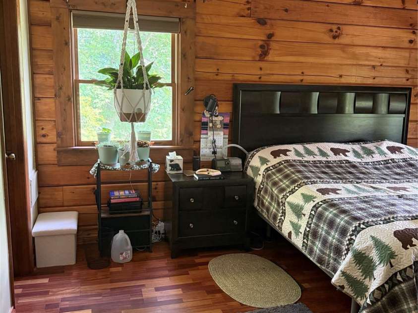 7 Noland Drive, Clyde, NC 28721.  MLS# CAR4379667, YatesRealty ID 24761. Master Bedroom