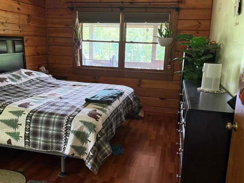 7 Noland Drive, Clyde, NC 28721.  MLS# CAR4379667, YatesRealty ID 24761. Master Bedroom