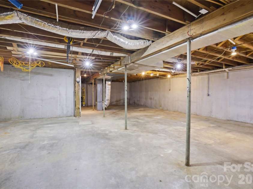 1959 Rock Springs Circle, Denver, NC 28037.  MLS# CAR4381566, YatesRealty ID 24762. Basement with contents virtually removed