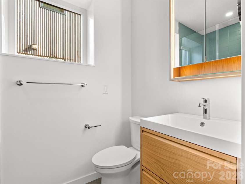 171 Houston Place, Asheville, NC 28801.  MLS# CAR4335456, YatesRealty ID 24763. Lower Level Bathroom
