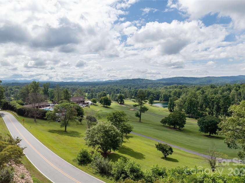 140 Bent Tree Drive, Hendersonville, NC 28739.  MLS# CAR4276557, YatesRealty ID 24764. Across the street from HVL Country Club