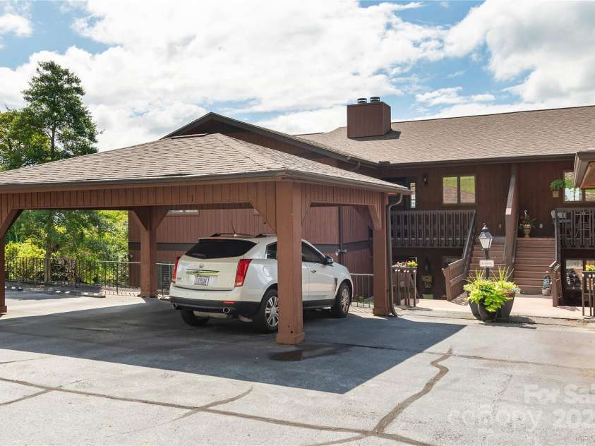 140 Bent Tree Drive, Hendersonville, NC 28739.  MLS# CAR4276557, YatesRealty ID 24764. Front Carport-assigned