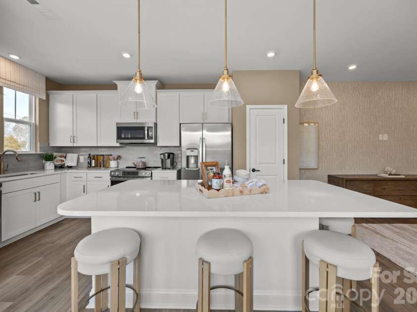 5016 Asher James Lane, Charlotte, NC 28262.  MLS# CAR4340997, YatesRealty ID 24765. DECORATED MODEL HOME