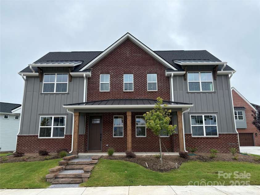 909 Coast Drive, Tega Cay, SC 29708.  MLS# CAR4279425, YatesRealty ID 24766. Exterior of home