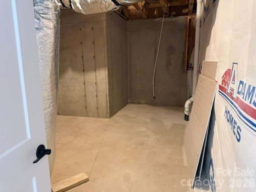 1255 Gardenia Drive, Mt Ulla, NC 28125.  MLS# CAR4363142, YatesRealty ID 24767. Unfinished storage space in basement