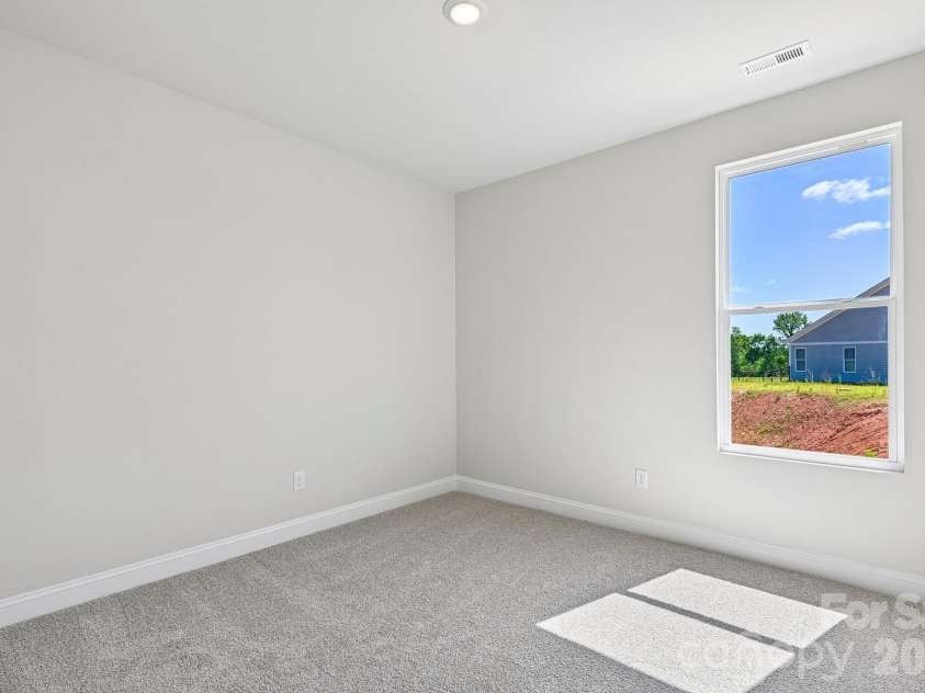 605 Banter Lane, Cramerton, NC 28032.  MLS# CAR4374152, YatesRealty ID 24768. 2nd main level additional bedroom