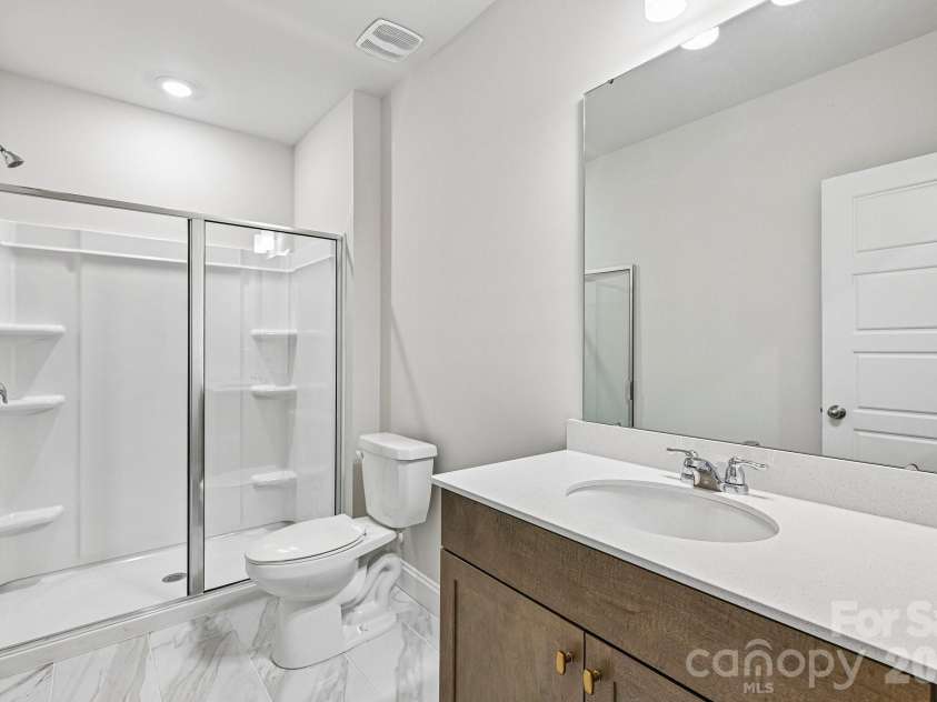 605 Banter Lane, Cramerton, NC 28032.  MLS# CAR4374152, YatesRealty ID 24768. Basement full bathroom