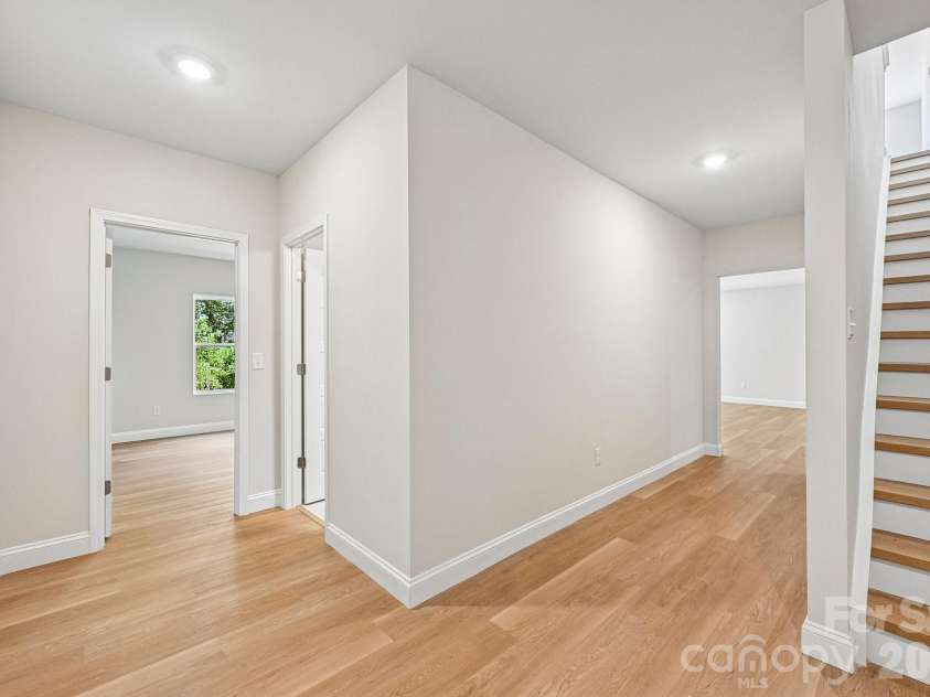 605 Banter Lane, Cramerton, NC 28032.  MLS# CAR4374152, YatesRealty ID 24768. Basement landing