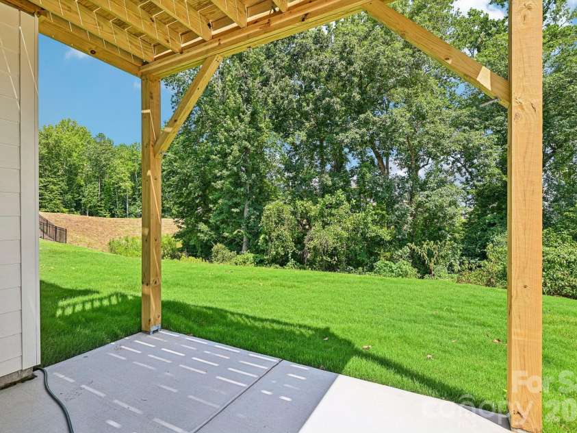 605 Banter Lane, Cramerton, NC 28032.  MLS# CAR4374152, YatesRealty ID 24768. Basement walkout patio