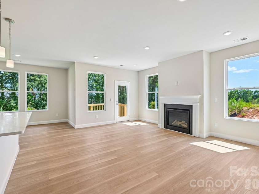 605 Banter Lane, Cramerton, NC 28032.  MLS# CAR4374152, YatesRealty ID 24768. Looking into the main level great room from the front entry hallway