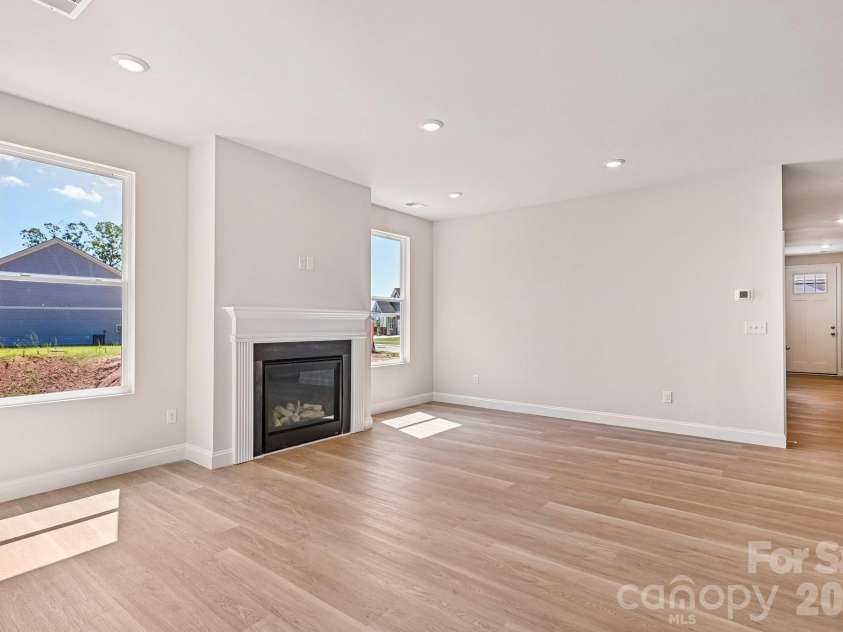 605 Banter Lane, Cramerton, NC 28032.  MLS# CAR4374152, YatesRealty ID 24768. Main level great room