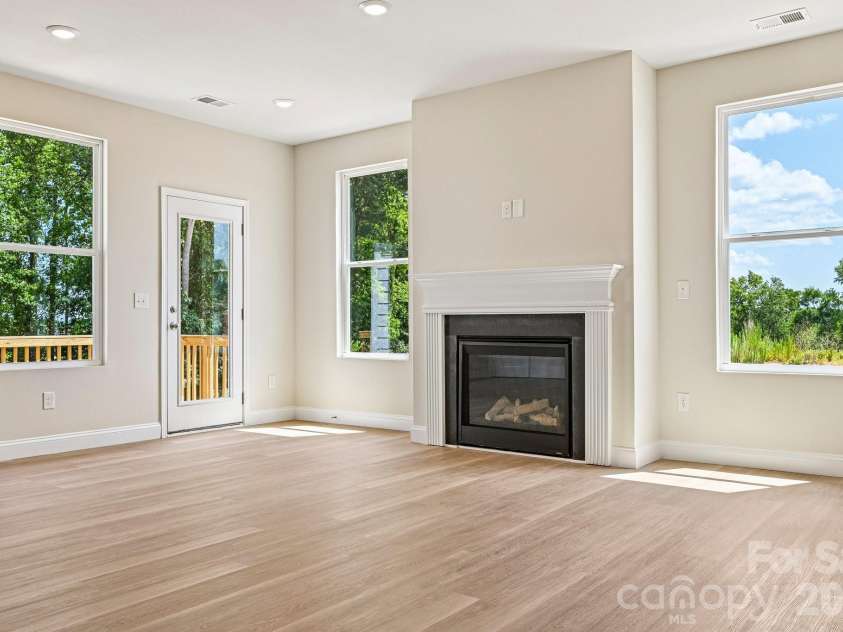 605 Banter Lane, Cramerton, NC 28032.  MLS# CAR4374152, YatesRealty ID 24768. Main level great room