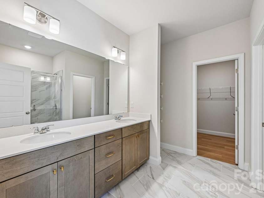 605 Banter Lane, Cramerton, NC 28032.  MLS# CAR4374152, YatesRealty ID 24768. Primary bathroom