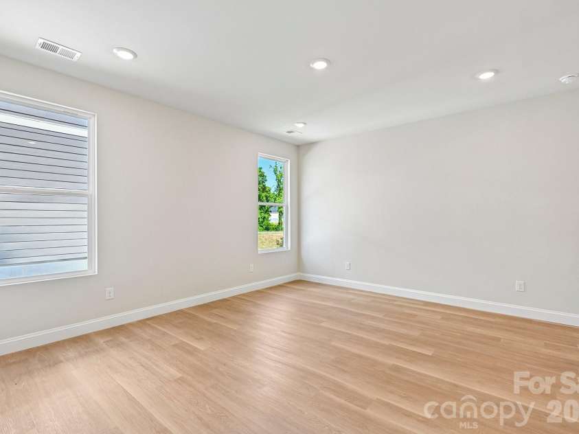 605 Banter Lane, Cramerton, NC 28032.  MLS# CAR4374152, YatesRealty ID 24768. Primary bedroom on main/upper level