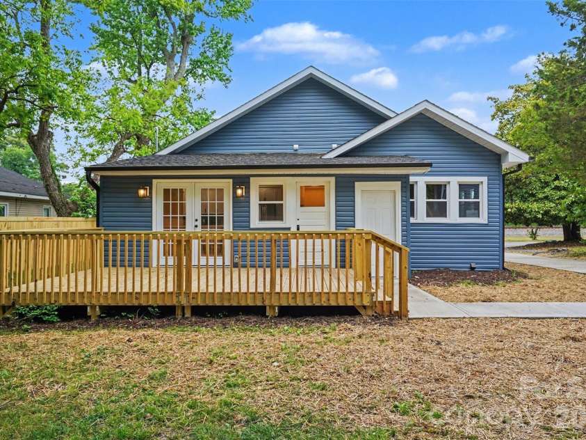 317 Ridge Avenue, Kannapolis, NC 28083.  MLS# CAR4371410, YatesRealty ID 24769. Back House and Deck