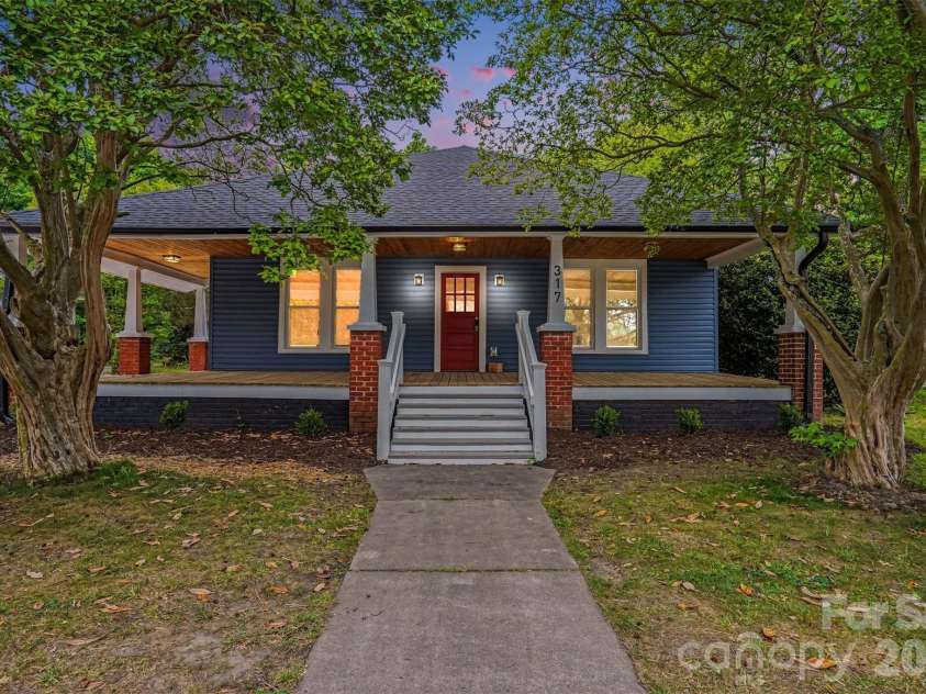317 Ridge Avenue, Kannapolis, NC 28083.  MLS# CAR4371410, YatesRealty ID 24769. Front Evening