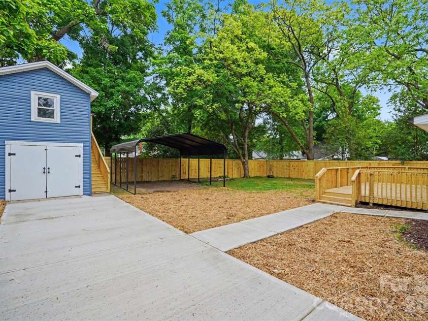 317 Ridge Avenue, Kannapolis, NC 28083.  MLS# CAR4371410, YatesRealty ID 24769. Outbuilding and Driveway