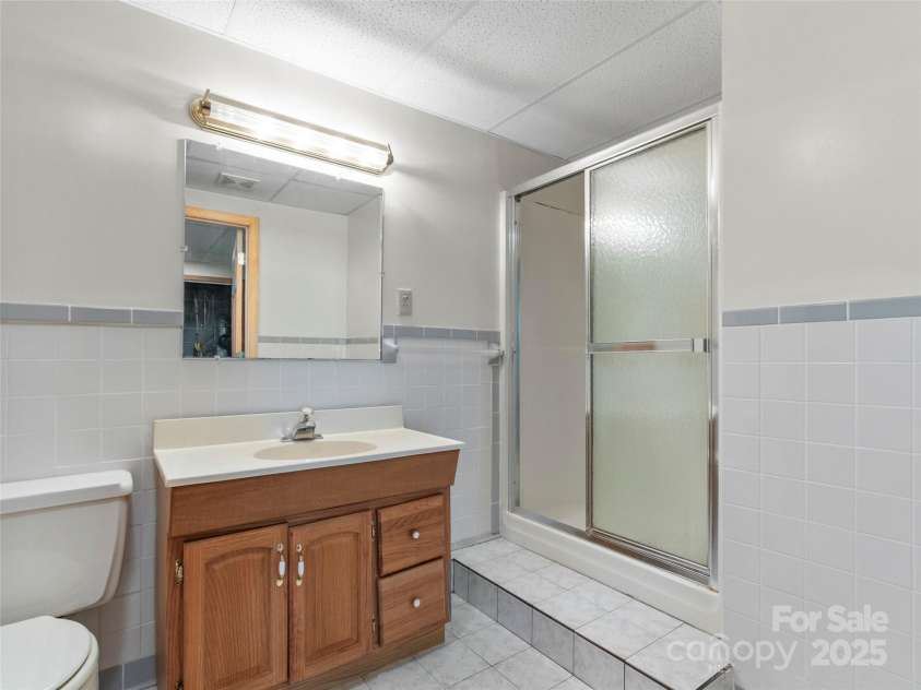 145 Appalachian Drive, Burnsville, NC 28714.  MLS# CAR4164720, YatesRealty ID 2477. Bathroom #3 located in basement