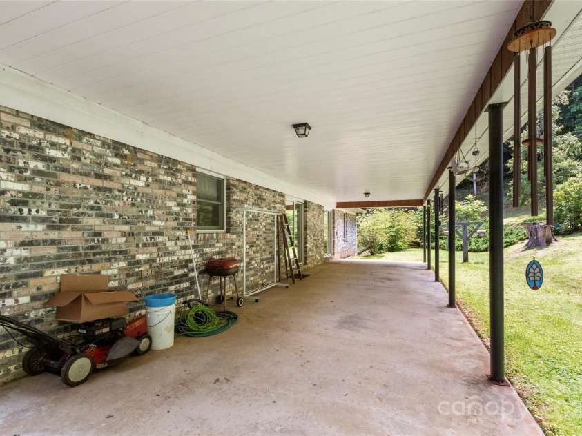 145 Appalachian Drive, Burnsville, NC 28714.  MLS# CAR4164720, YatesRealty ID 2477. Covered back patio
