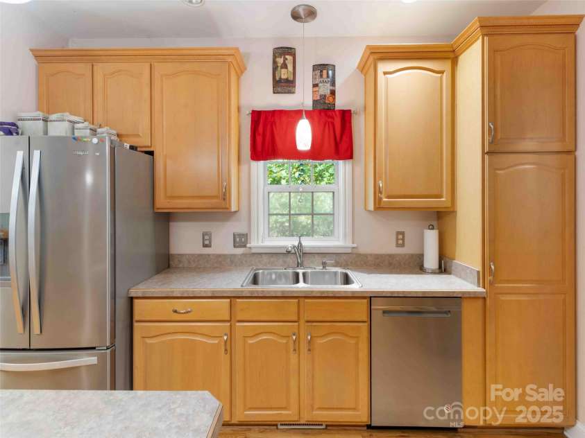 37 C Creek Lane, Pisgah Forest, NC 28768.  MLS# CAR4314709, YatesRealty ID 2477. Bright kitchen with ample cabinetry and workspace for daily living and entertaining.