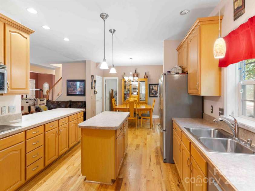 37 C Creek Lane, Pisgah Forest, NC 28768.  MLS# CAR4314709, YatesRealty ID 2477. Bright kitchen with ample cabinetry and workspace for daily living and entertaining.