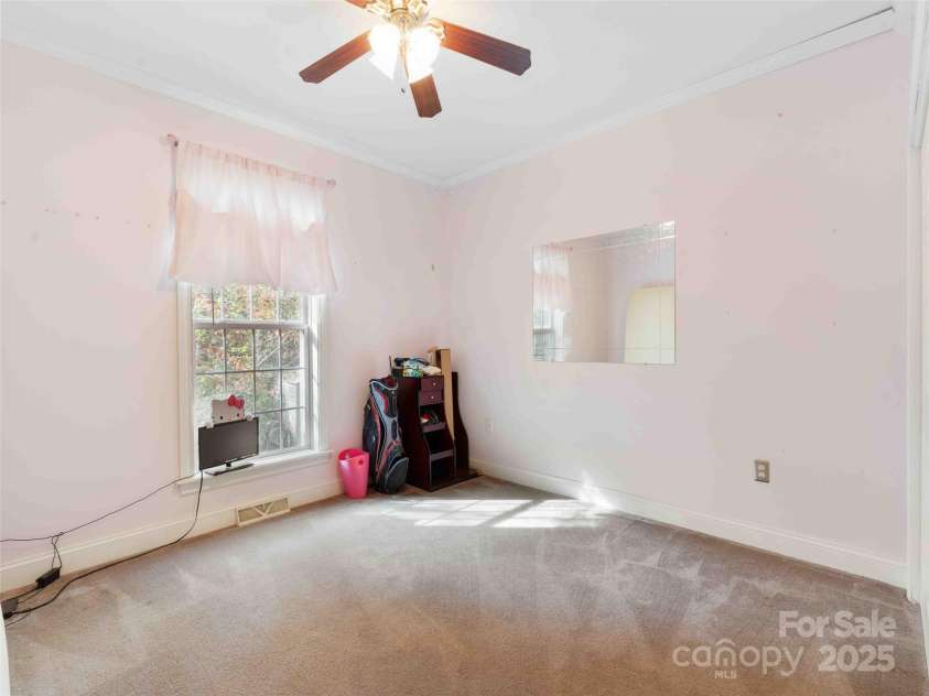 37 C Creek Lane, Pisgah Forest, NC 28768.  MLS# CAR4314709, YatesRealty ID 2477. Comfortable bedroom with natural light and closet space