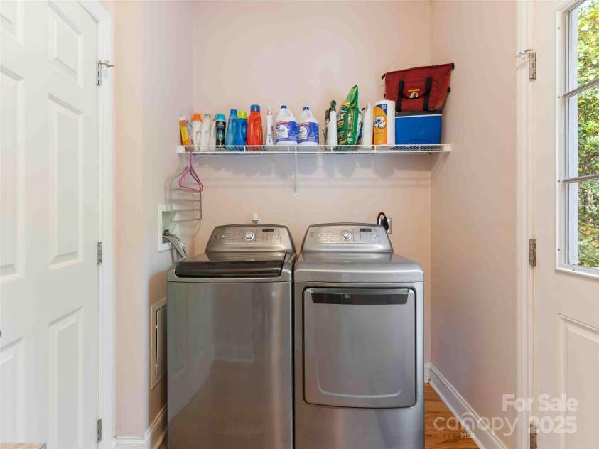 37 C Creek Lane, Pisgah Forest, NC 28768.  MLS# CAR4314709, YatesRealty ID 2477. Functional utility room with added storage