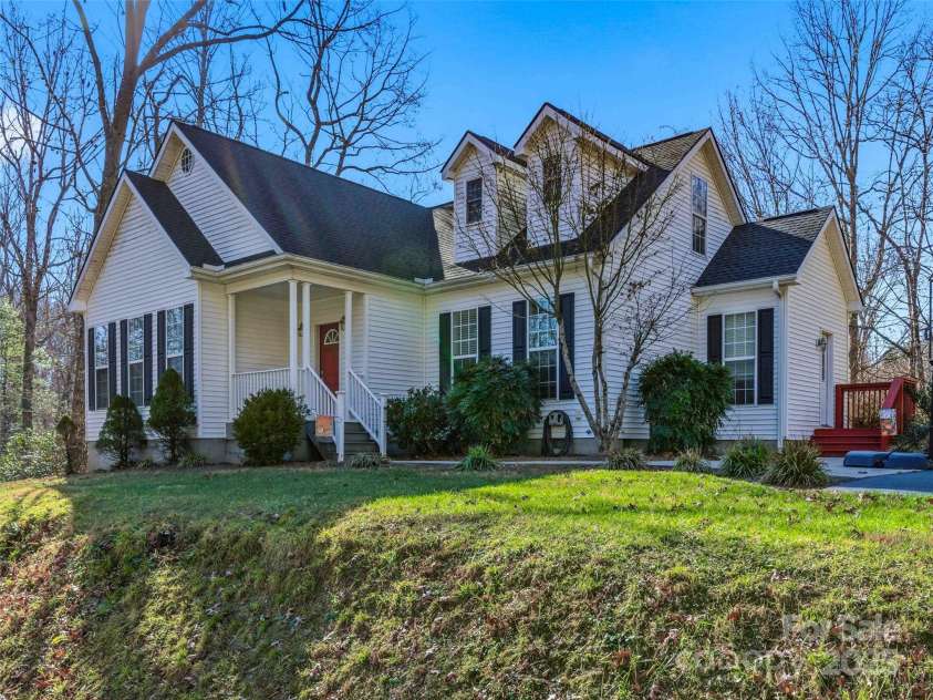 37 C Creek Lane, Pisgah Forest, NC 28768.  MLS# CAR4314709, YatesRealty ID 2477. Inviting exterior with clean lines and strong curb appeal
