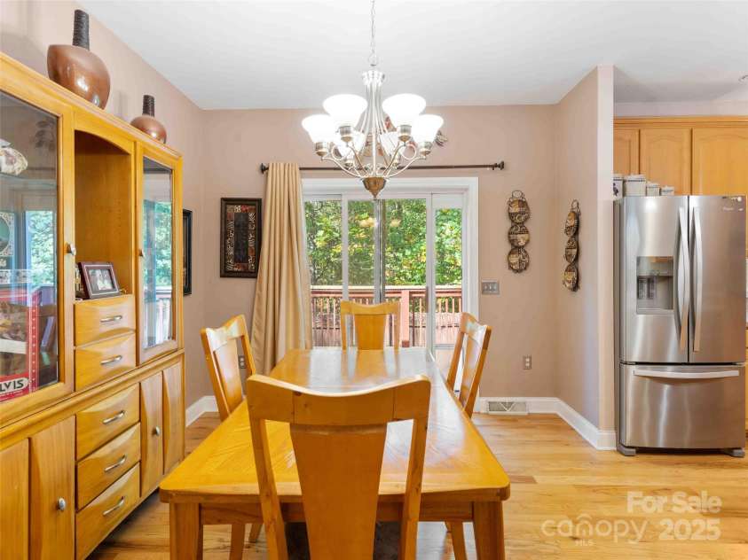 37 C Creek Lane, Pisgah Forest, NC 28768.  MLS# CAR4314709, YatesRealty ID 2477. Open dining area conveniently located off the kitchen and living room