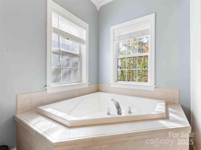37 C Creek Lane, Pisgah Forest, NC 28768.  MLS# CAR4314709, YatesRealty ID 2477. Private primary bath with a clean, functional layout