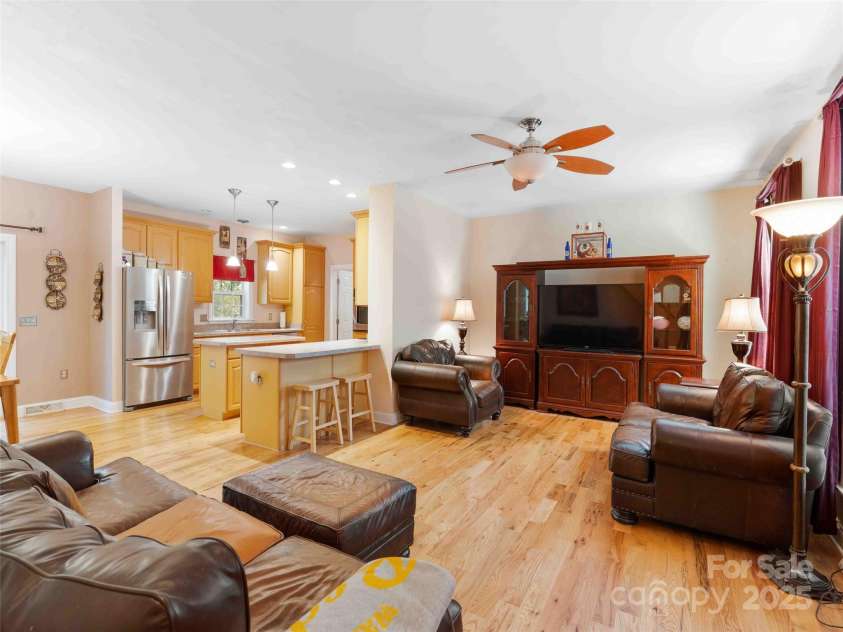 37 C Creek Lane, Pisgah Forest, NC 28768.  MLS# CAR4314709, YatesRealty ID 2477. Spacious open-concept layout offering a seamless flow between living, dining, and kitchen areas.