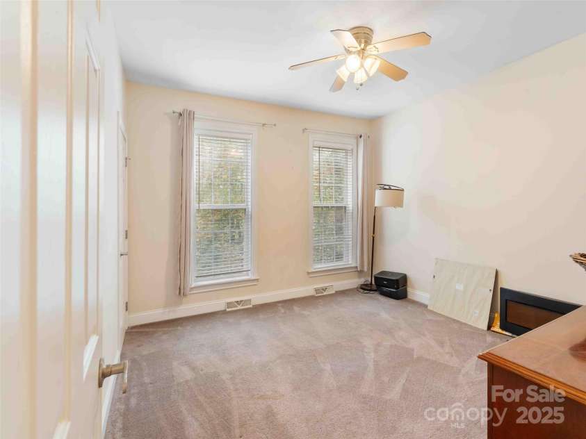 37 C Creek Lane, Pisgah Forest, NC 28768.  MLS# CAR4314709, YatesRealty ID 2477. Versatile bedroom ideal for guests or a home office.