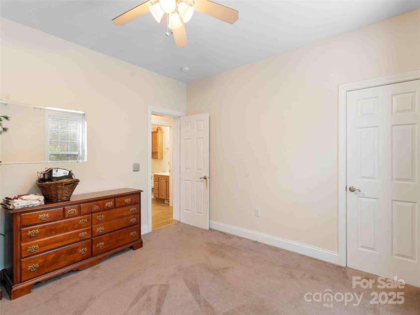 37 C Creek Lane, Pisgah Forest, NC 28768.  MLS# CAR4314709, YatesRealty ID 2477. Versatile bedroom ideal for guests or a home office.